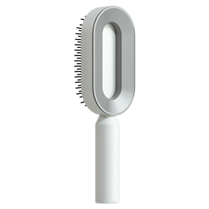 Self-cleaning hairbrush
