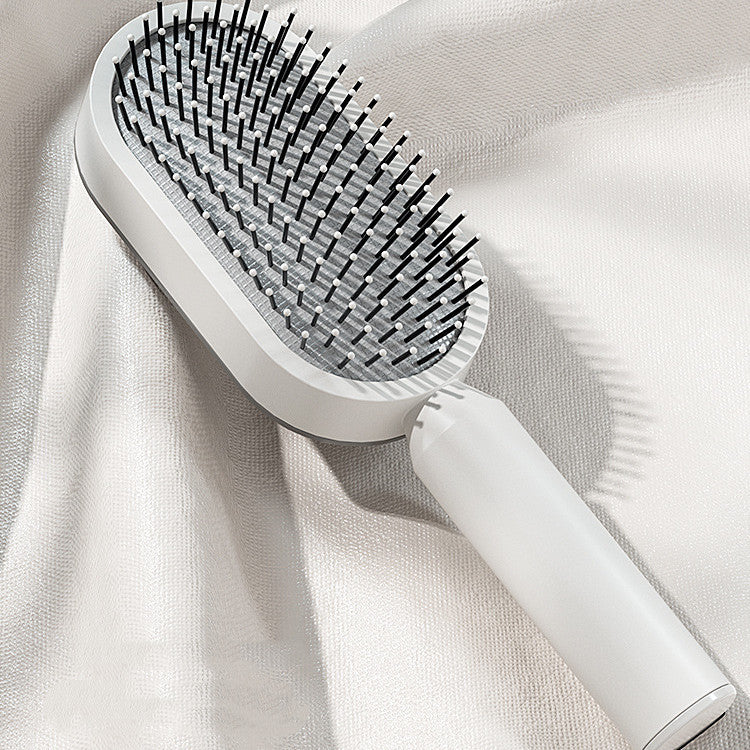 Self-cleaning hairbrush